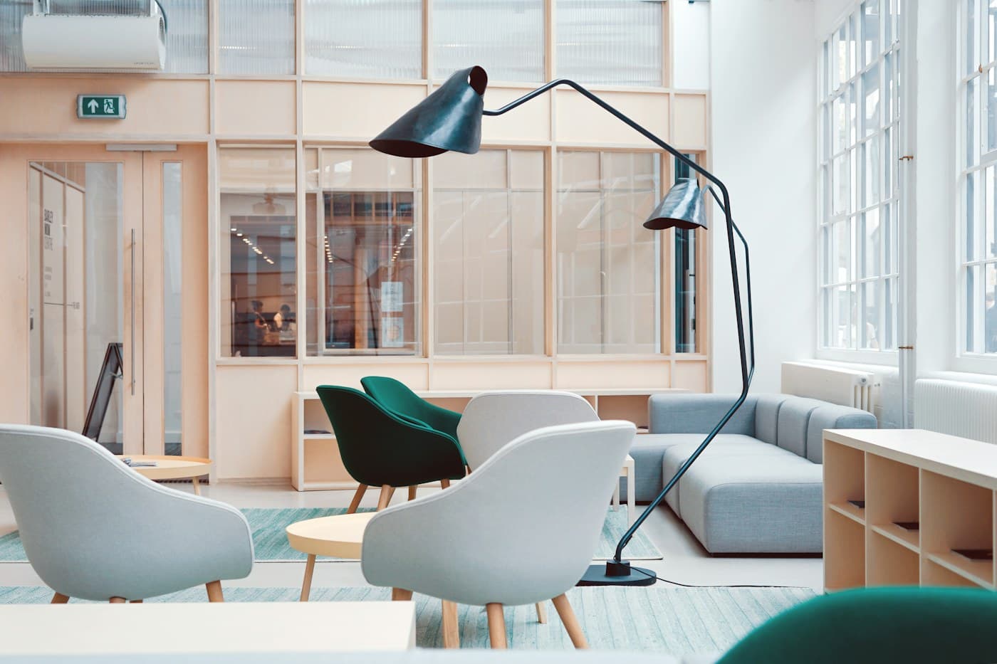 Bright creative workspace with shared tables and natural materials