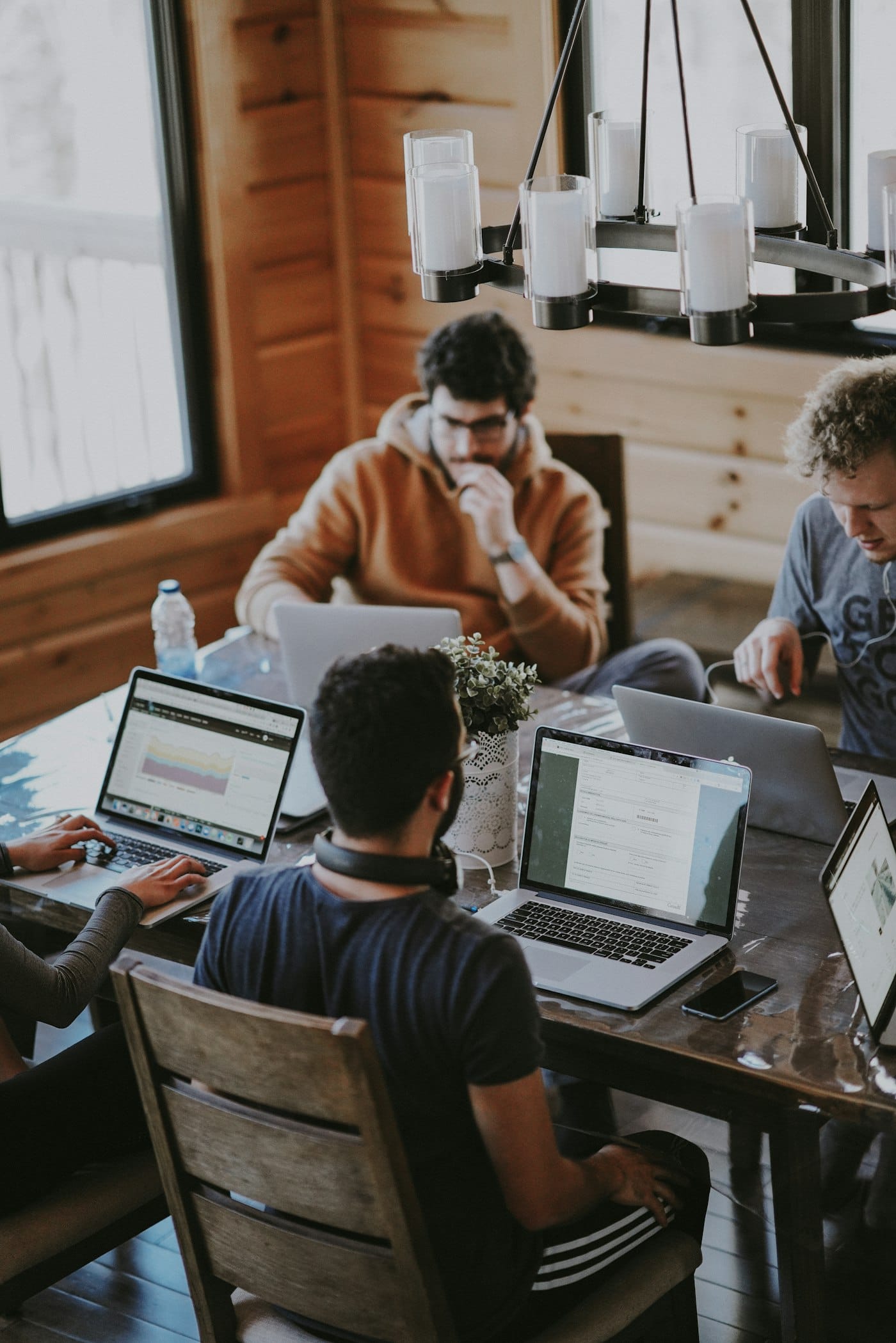 People discussing a business project in a shared workspace